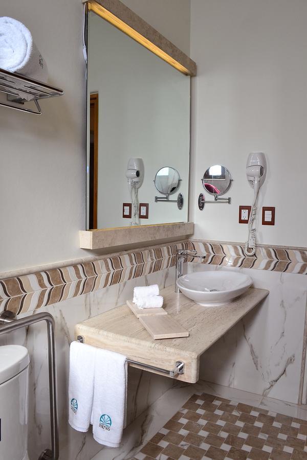 إكسميكيلبان Palmas Hotel & Spa المظهر الخارجي الصورة